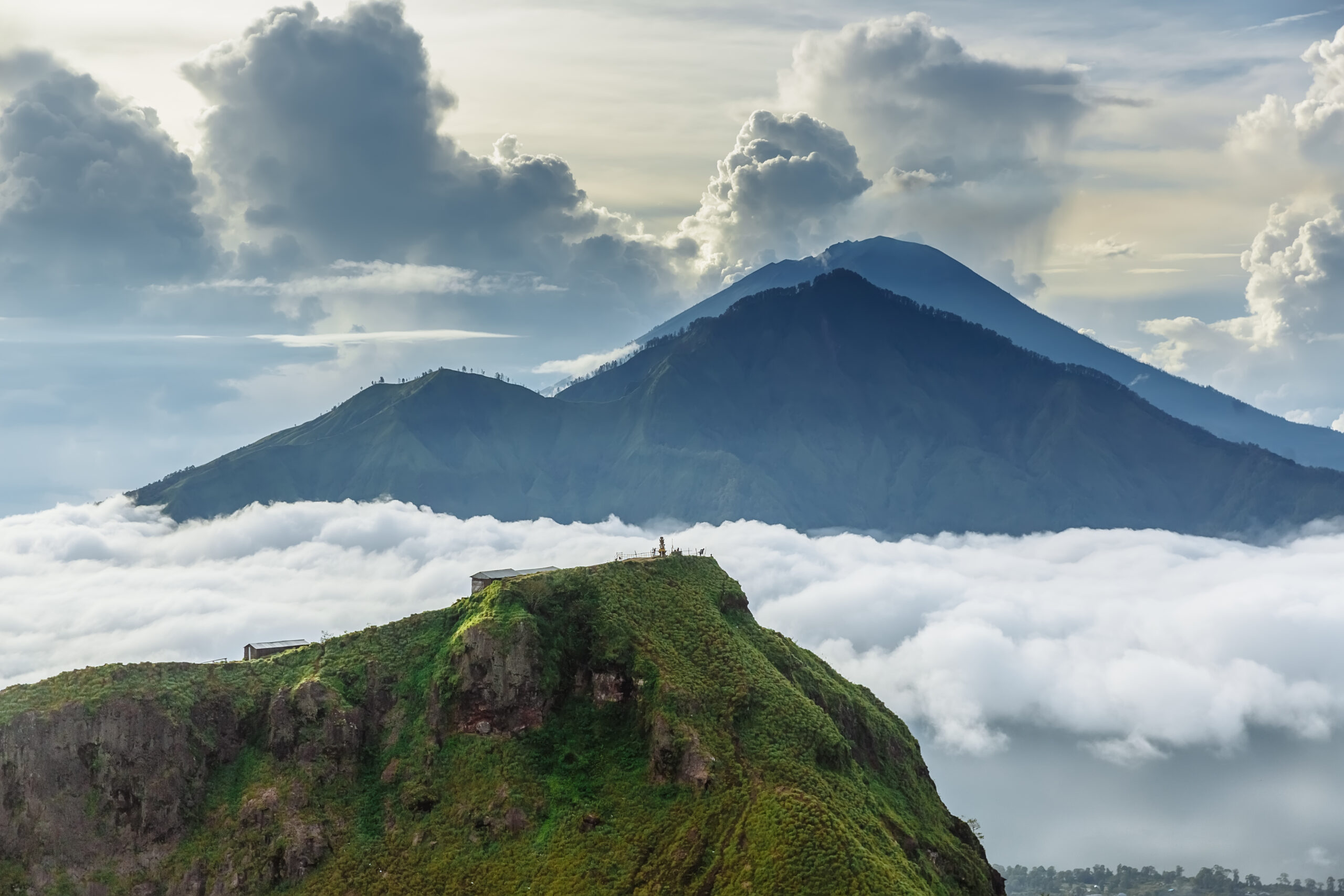 Active Indonesian volcano Batur in the tropical island Bali. Indonesia. Batur volcano sunrise serenity. Dawn sky at morning in mountain. Serenity of mountain landscape, travel concept.